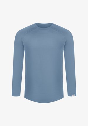 Langdurige sportshirt met lange mouwen in lichtblauw, gladde textuur, ronde hals, raglanmouwen en met zijsplitten voor meer bewegingsvrijheid.