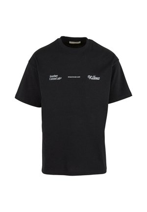 Another Cotton Lab, OFFLINE LUXURY - T-shirt imprimé - black