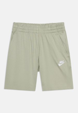 Svijetlo zelene Nike kratke hlače s elastičnim pojasom, bočnim džepovima i bijelim Nike logotipom na lijevom bedru.