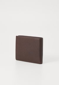 Portefeuille en cuir marron avec une finition texturée, de forme rectangulaire et couture visible le long des bords. Design compact et élégant.