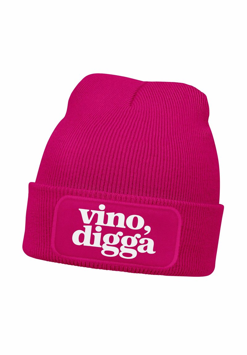 Pink knitted beanie featuring a thick cuff. Front label displays the text "vino, digga" in bold white font. Soft texture, close-fitting design.
