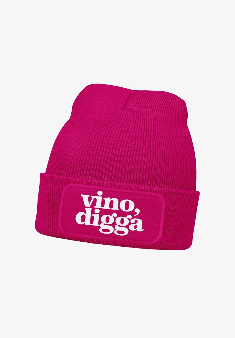Pink knitted beanie featuring a thick cuff. Front label displays the text "vino, digga" in bold white font. Soft texture, close-fitting design.