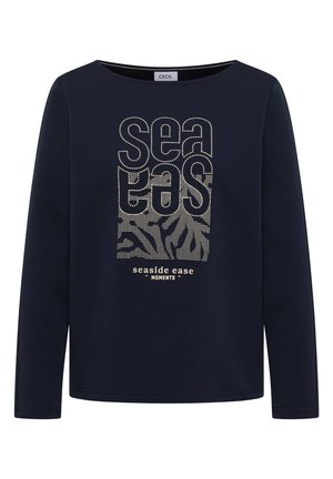 Granatowa koszula z długim rękawem i okrągłym dekoltem, z beżowym nakrapianym napisem "sea eas" oraz "seaside ease moments" z motywami fal i liści.