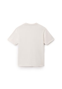 Kortærmet t-shirt med rund hals lavet af blødt, let beige bomuld. Har en simpel ensfarvet design uden synlige mønstre eller dekorative elementer.
