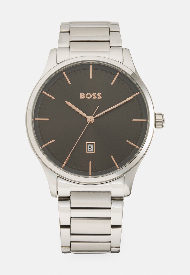 Montre en acier inoxydable argenté avec un cadran gris foncé, des accents en or rose, des index horaires et un affichage de la date à 6 heures, dotée d'un bracelet en maillons métalliques.