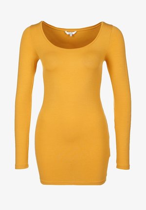 Top ajustado de manga larga en un vibrante color amarillo. Presenta un escote redondeado y está hecho de una tela suave y elástica. Textura limpia y suave.