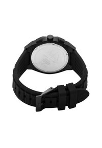 Montre en caoutchouc noir avec un bracelet texturé et un fond en acier inoxydable. Présente des accents audacieux et une boucle de marque.