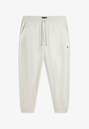 Pantalon de jogging gris clair à taille élastique avec cordon de serrage, poches latérales, chevilles resserrées et petit logo Tommy Hilfiger sur la cuisse droite.