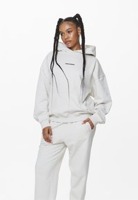 Pegador ATNA LOGO - Mikina - washed salty cream