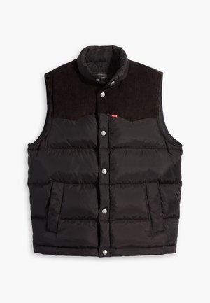 Zwarte gewatteerde vest met een corduroyen kraag, drukknoopsluiting en twee voorkezen. Het ontwerp heeft gestikte secties voor isolatie.