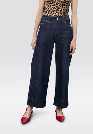 Vaqueros a campana - denim