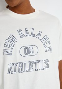 New Balance GRAPHIC 1 - Potiskana majica - sea salt