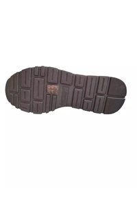 Suola in gomma nera con motivi di presa testurizzati, caratterizzati da forme rettangolari e circolari, e logo impresso al centro.