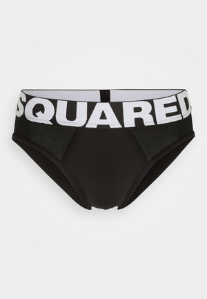 Boxers noirs avec une ceinture élastique blanche portant le mot "SQUARED" en lettres gras. Le tissu est lisse avec des détails de texture subtils.