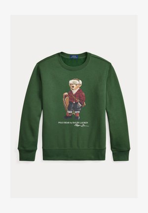 Tamnozelena majica s grafikonom medvjeda u crvenoj kariranoj košulji i šeširu, koji drži rukavicu za bejzbol. Riblji manšeti i rub.