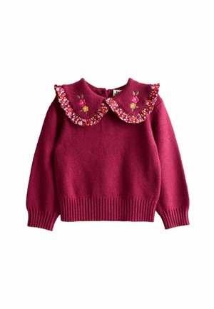 Ciemnoróżowy, dziergany sweter dziecięcy z marszczonym kołnierzykiem w kwiatowy wzór, zdobiony różowym i żółtym haftem kwiatowym.