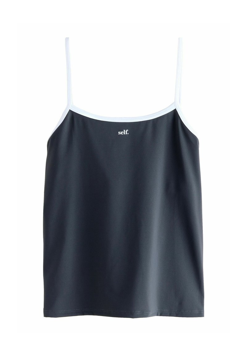 Dark gray tank top with thin straps, featuring a white accent along the neckline and the brand name "self." printed in white at the center.