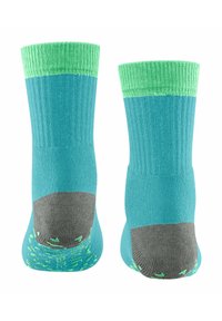 Türkise Socken mit einem grünen gerippten Bündchen, grauem Fersenbereich und einer strukturierten Sohle, die ein kleines Muster für besseren Halt aufweist. Glatt gestricktes Material insgesamt.