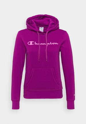 Fioletowa bluza Champion z kapturem, przednią kieszenią, regulacją sznurkową kaptura i jasnoróżowym logo Champion na piersi.