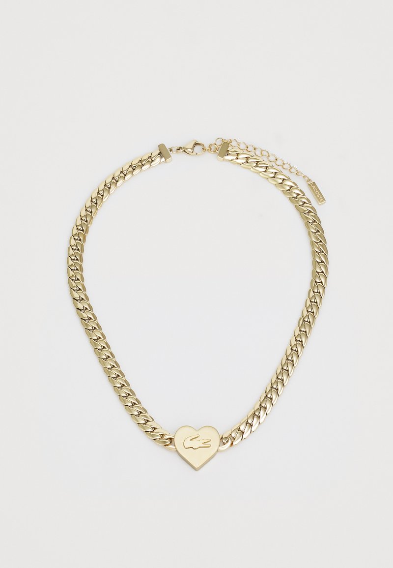 Χρυσή αλυσίδα κολιέ με διασυνδεδεμένα κρίκους, χυτή καρδιά με λογότυπο, και αλυσίδα επέκτασης για ρυθμιζόμενο μήκος.
