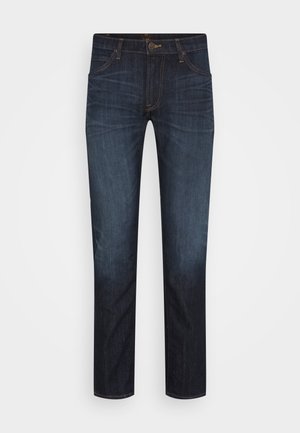 Dark blue denim jeans with a straight leg design, featuring five pockets, subtle stitching, and a zip fly with a button closure.