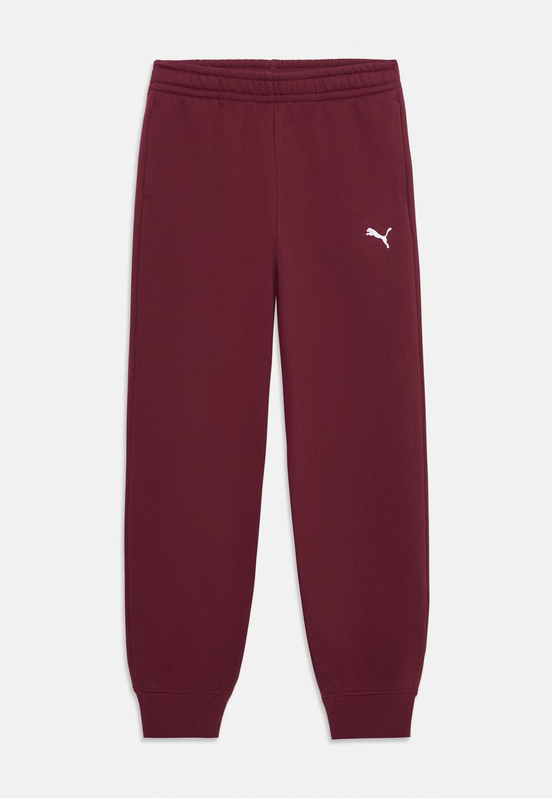 Bordeauxkleurige sweatpants van zachte stof, met een rekbare tailleband en gebreide boorden. Bevat een klein wit logo op het onderste been.