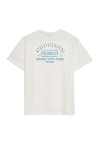 Camiseta de algodón blanca con un diseño impreso en azul en la parte posterior que dice "ATHLETICS GOODS MUNICH ORIGINAL SPORTS BRAND SINCE 1939."