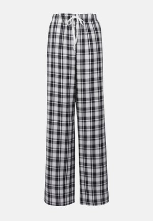 Sorte og hvide rutede pyjamabukser med afslappet pasform, snøreliv og letvægtsmateriale. Har et ternet mønster overalt.