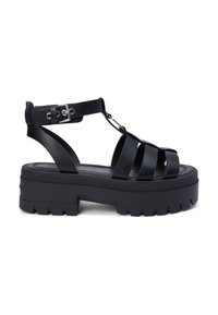 Μαύρα σανδάλια πλατφόρμα με φαρδιές λουρίδες από PVC, σχεδιασμό Τ-μπαρ, ρυθμιζόμενο πόρπη και χοντρή ελαστική σόλα με υφή.