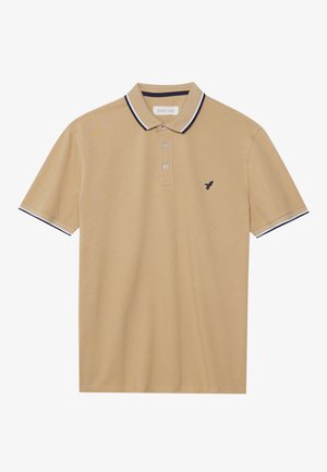 Beiges Poloshirt mit kurzen Ärmeln, einem Kragen, zwei Knöpfen, dunklem Abschluss an Kragen und Ärmeln und kleinem dunklem Vogel-Logo auf der Brust.