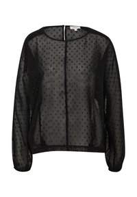 Blouse noire transparente à manches longues avec motif à pois texturé, encolure ronde, poignets élastiques et fermeture boutonnée au dos.