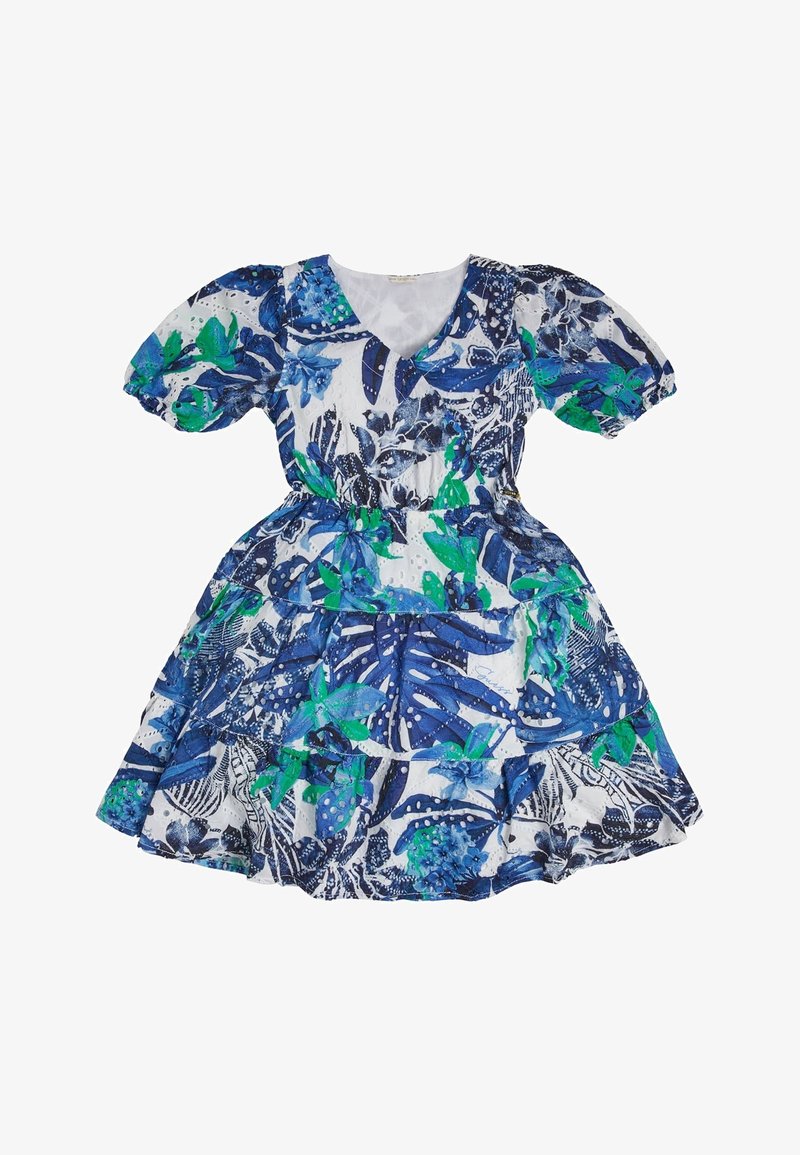 Robe fleurie bleue et verte avec manches bouffantes, col en V, jupe à volants et tissu léger avec un motif de feuilles tropicales.