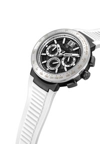 Moška kronografska ura s črnim številčnicom, srebrnimi detajli in belim gumijastim pasom. Ima izrazite podštevce in tachymeter obod.