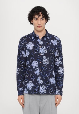 Navy button-up shirt featuring a floral pattern in light blue and white. Long sleeves, standard collar, and relaxed fit.