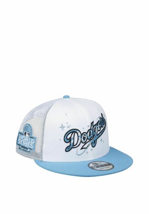 White and light blue Dodgers snapback cap with World Series 2024 patch on the mesh back and embroidered logo on the front.