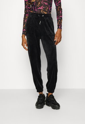 ONLREBEL VELVET CUFF PANTS - Tracksuit bottoms - black