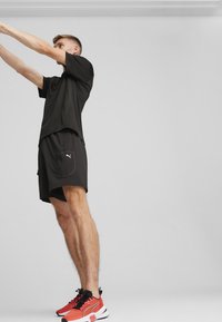 Puma PWRFRAME TR 3 - Hardloopschoenen voor op de weg - active red black white