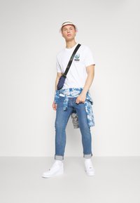 Levi's® 510™ SKINNY - Calças de ganga de corte skinny - medium indigo worn in