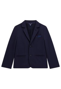 Marinblå blazer i mjukt tyg, med tvåknappsstängning, fickklaffar och två framfickor. Inkluderar en liten logotyp på bröstet.