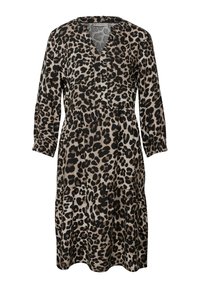 Leopardmönstrad klänning i beige och svart. Har V-ringning, långa ärmar och en volangkjol. Tillverkad av lätt tyg med en mjuk textur.