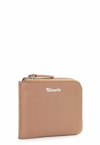 Tamaris wallet in soft, textured beige leather with a zip closure. Features a logo and compact, rectangular design for easy portability.