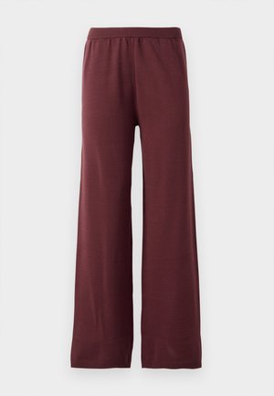Calças largas de cor bordô, feitas de tecido suave, com um cós elástico e uma textura suave. Sem padrões ou peças metálicas visíveis.