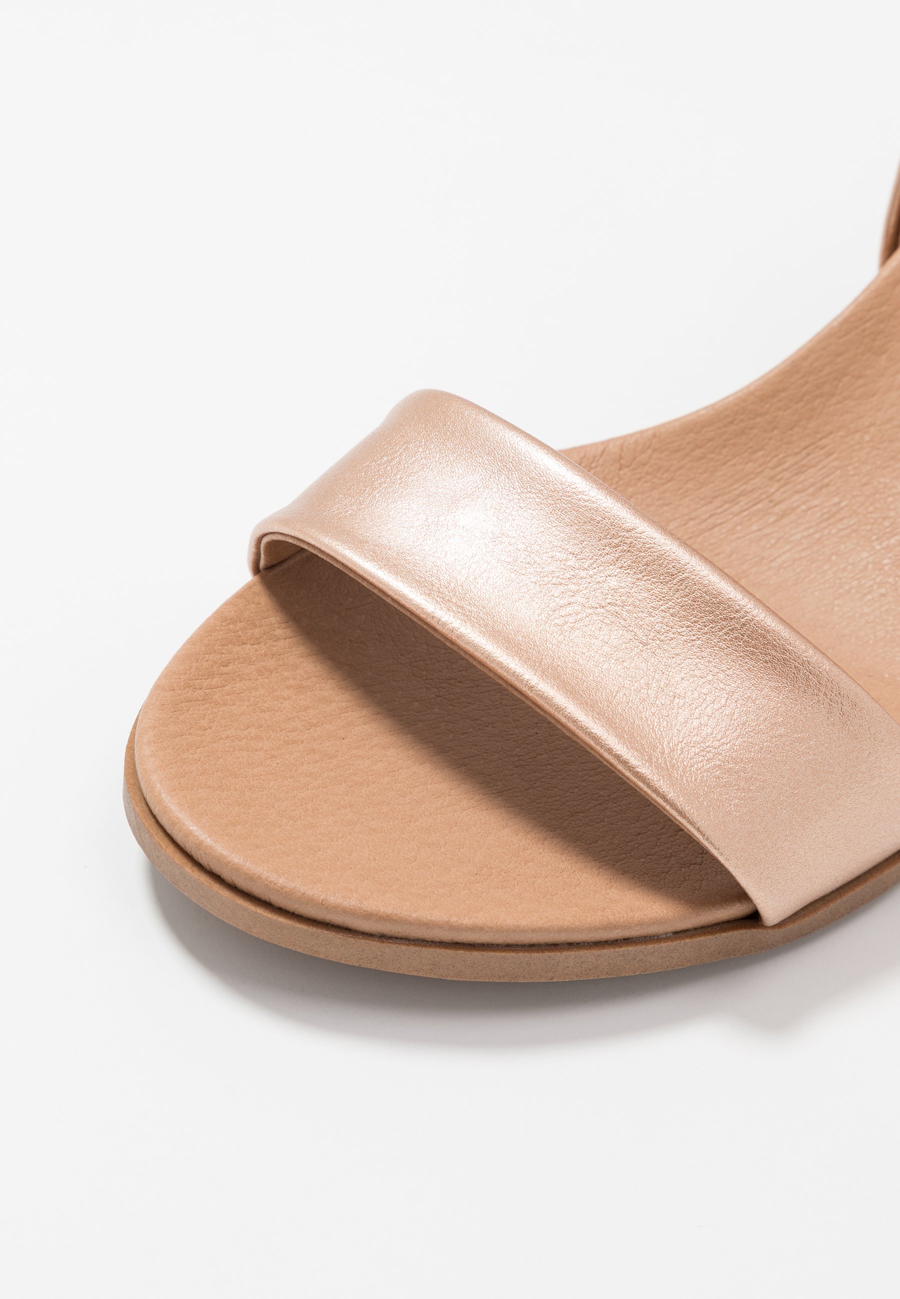 platypus nike slides