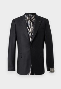 Μαύρο ραμμένο σακάκι με διακριτικό υφασμάτινο μοτίβο, εσωτερική επένδυση με ρίγες ζέβρας και λεπτομέρεια μανσέτας που ταιριάζει, με κλείσιμο με ένα κουμπί.