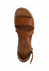 Brown leather sandal with woven strap design, cross-over ankle straps, and adjustable buckle. Cushioned interior and textured sole.