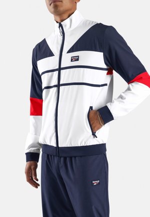Reebok, HERITAGE LOGO TRACK TOP-WHITE . - Trainingsvest - white navy red