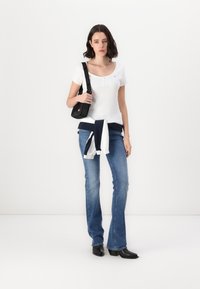 Tommy Jeans SLIM HENLEY - T-shirts - white