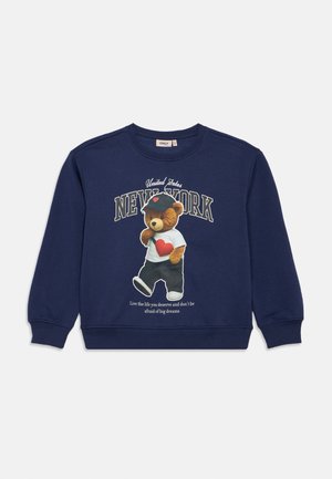 Felpa navy con grafica di un orso che indossa una maglietta con un cuore e pantaloni neri. Include la scritta "NEW YORK" e uno slogan motivazionale sottostante.