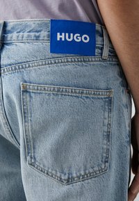 HUGO JONAH - Tiesaus kirpimo džinsai - light/pastel blue