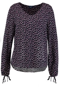 Blusa a maniche lunghe blu navy con motivo a foglie rosa e bianche, scollatura a V e lacci ai polsi.